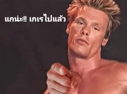 a shirtless man is pointing at the camera in a painting .