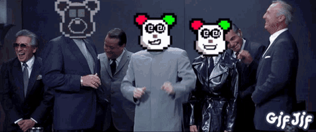 a group of men are standing in front of a wall with a gif jif on the bottom