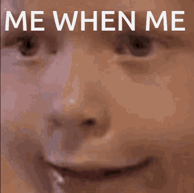 a close up of a child 's face with the words me when me written above it