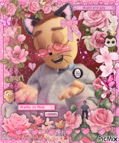 a picture of a stuffed animal with a cat ear surrounded by pink roses