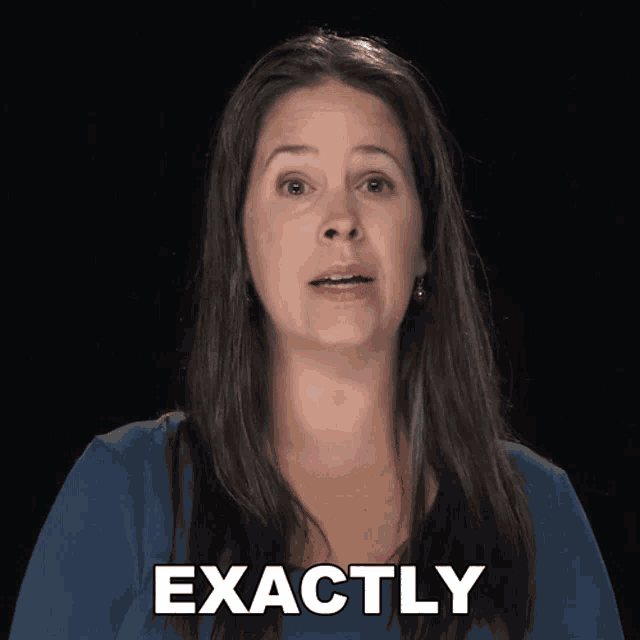 a woman in a blue shirt says exactly in white letters