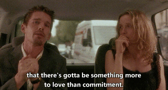 a man and a woman are sitting in a car and the man is saying that there 's gotta be something more