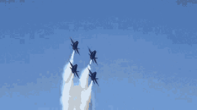 four us navy fighter jets fly in formation