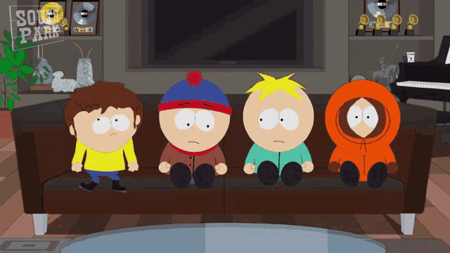 four south park characters are sitting on a couch in a living room