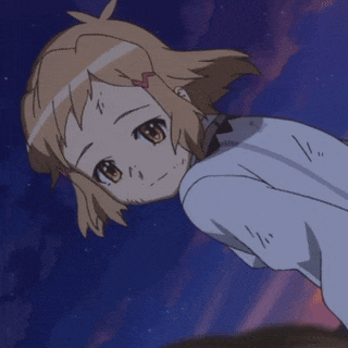 a girl with a bow in her hair is sleeping in the dark