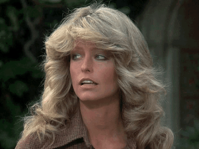 a close up of a woman with blonde hair