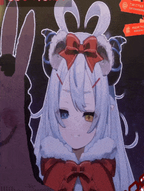 a girl with a red bow in her hair has a twitter sign above her