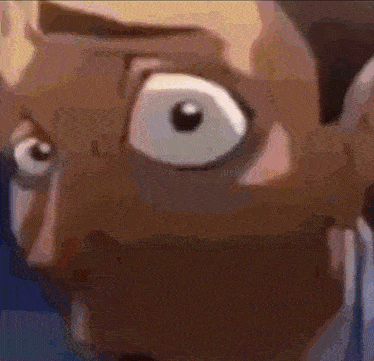 a close up of a cartoon character 's face with a surprised look on his face .