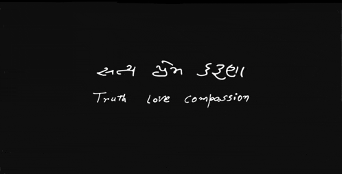 a black background with truth love compassion written in white