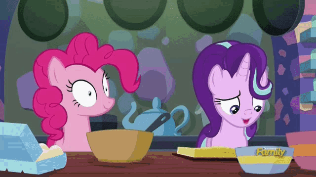 pinkie pie and starlight glimmer from my little pony sit at a table with bowls of food