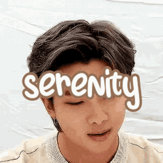 a close up of a person 's face with the word serenity written above it