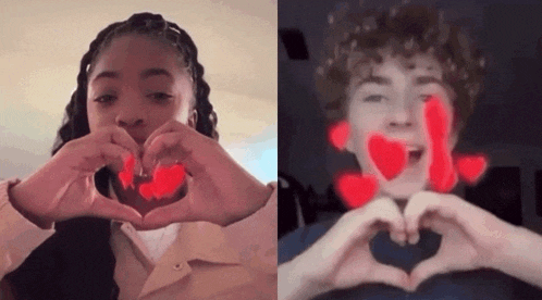 a boy and a girl are making a heart shape with their hands
