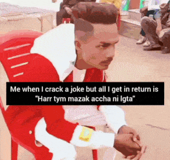 a man is sitting in a chair with a caption that says me when i crack a joke