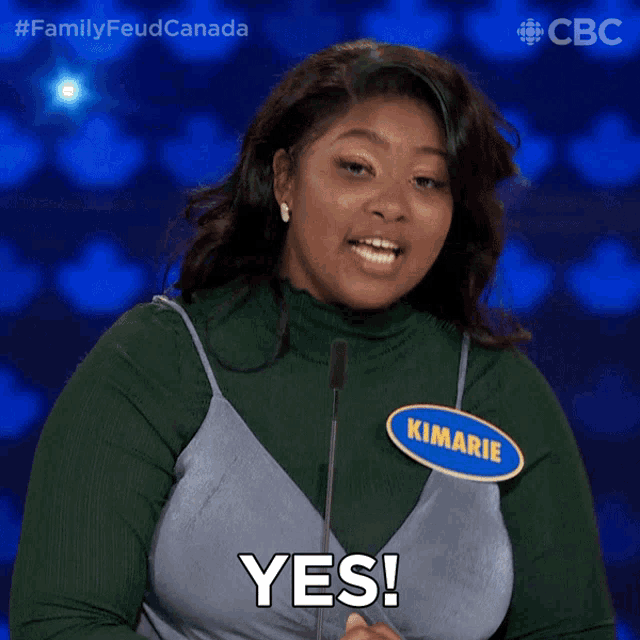 a woman with a name tag that says " kimarie " on it