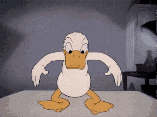 a cartoon duck is standing on a table with his arms outstretched