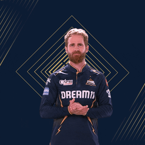 a man with a beard is wearing a jersey that says dreami on it
