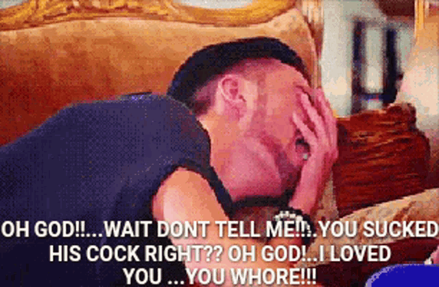 a man is laying on a couch covering his face with his hands and a caption that starts with oh god
