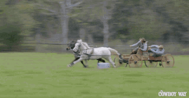 a cowboy is pulling a wagon pulled by two horses with the cowboy way written on the bottom