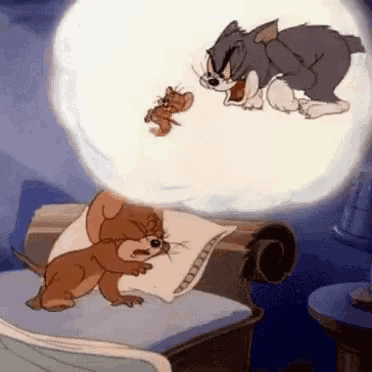 a cartoon of tom and jerry laying on a bed with a speech bubble coming out of their mouths .