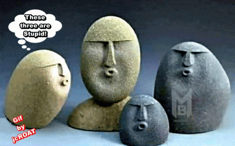 a group of statues with a thought bubble saying these three are stupid