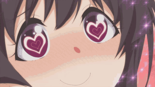 a close up of a girl 's face with heart shaped eyes