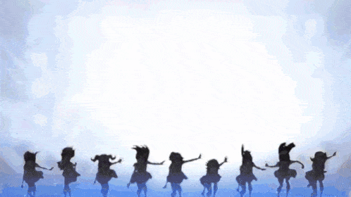 a group of anime girls are dancing on a stage