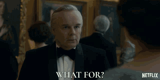 a man in a tuxedo says " what for "