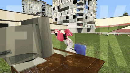 a computer screen shows a person sitting at a desk in front of a large building with the letter f on it