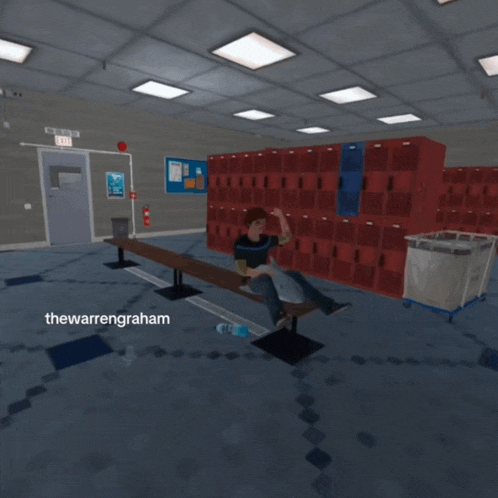 a person is sitting on a bench in a locker room with the name thewarrengraham on the bottom