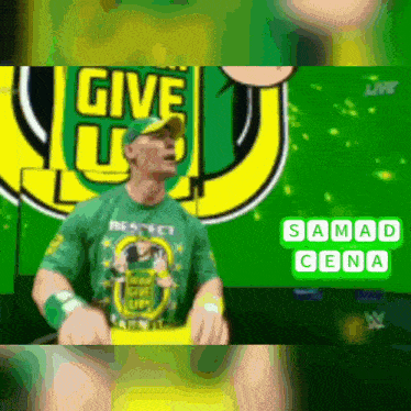 a man in a green shirt that says give up on it