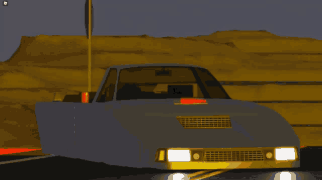 a car is parked on the side of the road with a yellow sign in the background