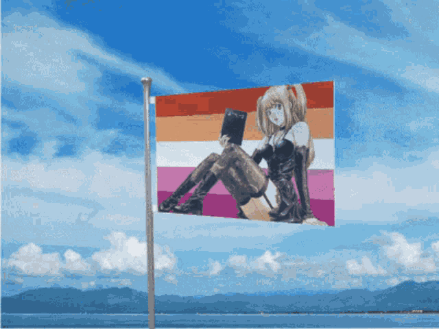 a flag with a picture of a girl on it is flying in the wind