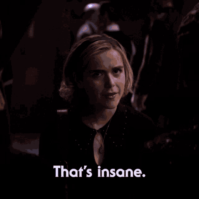 a woman says that 's insane next to her face