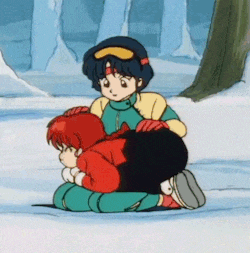a couple of cartoon characters are kneeling down in the snow