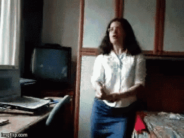 a woman in a white shirt and blue skirt is dancing in a room with imgflip.com at the bottom of the image