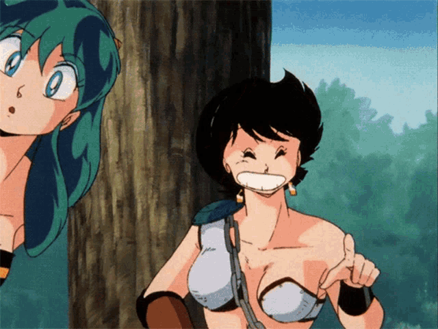 a woman with a huge smile on her face is standing next to another woman