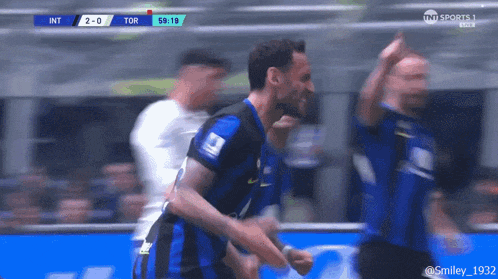 a soccer player celebrates a goal against tor
