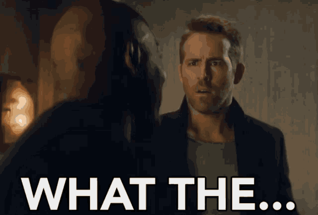 two men are standing next to each other and one of them is saying what the ...