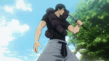 a man is holding a sword in his hand in front of a tree .