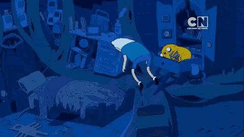 a cartoon character laying on a bed with cn on the bottom