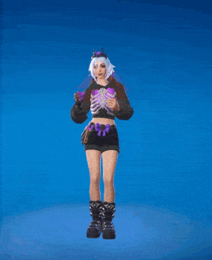 a girl in a skeleton costume is dancing in the air