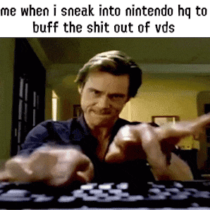 a man is typing on a keyboard with a caption that says me when i sneak into nintendo hq to buff the shit