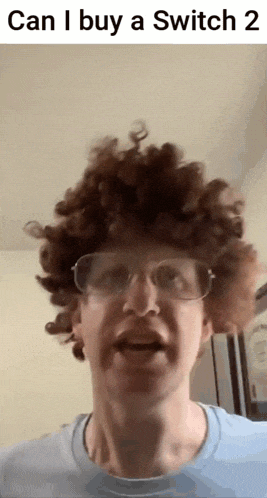a man wearing glasses and a wig says " can i buy a switch "