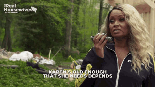 a woman is talking on a cell phone with the words karen 's old enough that she needs depends