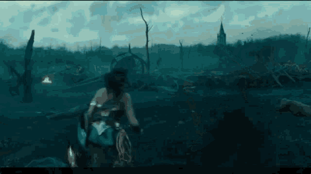 a woman in a superhero costume is walking through a field with a cane .