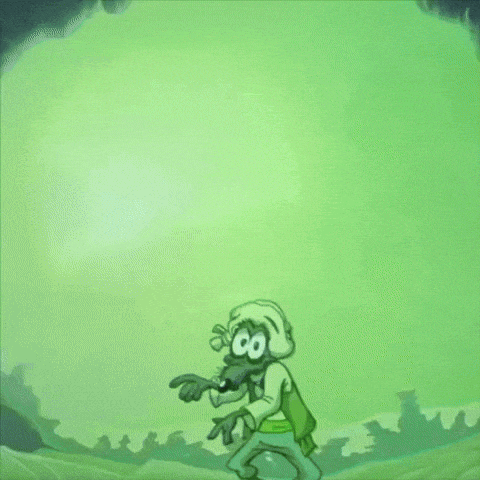 a green cartoon character with big eyes is pointing