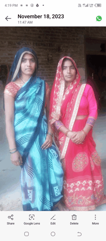 a phone screen shows two women standing next to each other on november 18