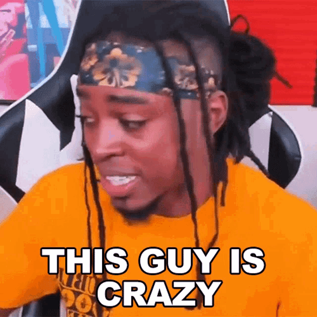 a man with dreadlocks and a headband is saying this guy is crazy