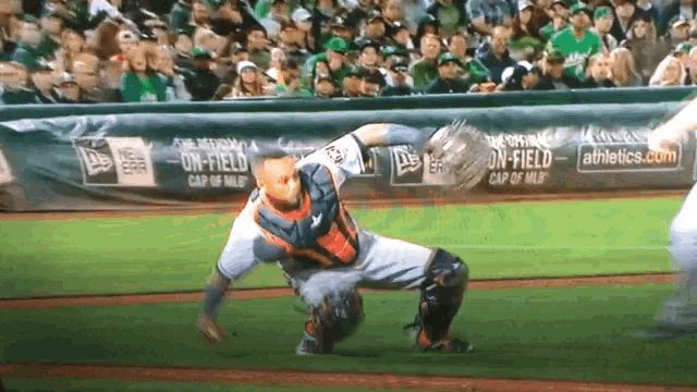 a baseball game is being played in front of a banner that says on field