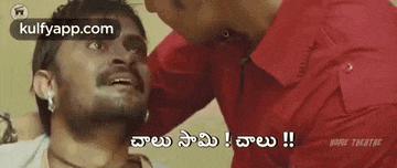 two men are talking to each other in a foreign language .